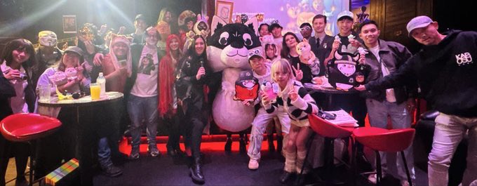 Astro Neko community event group photo with mascot