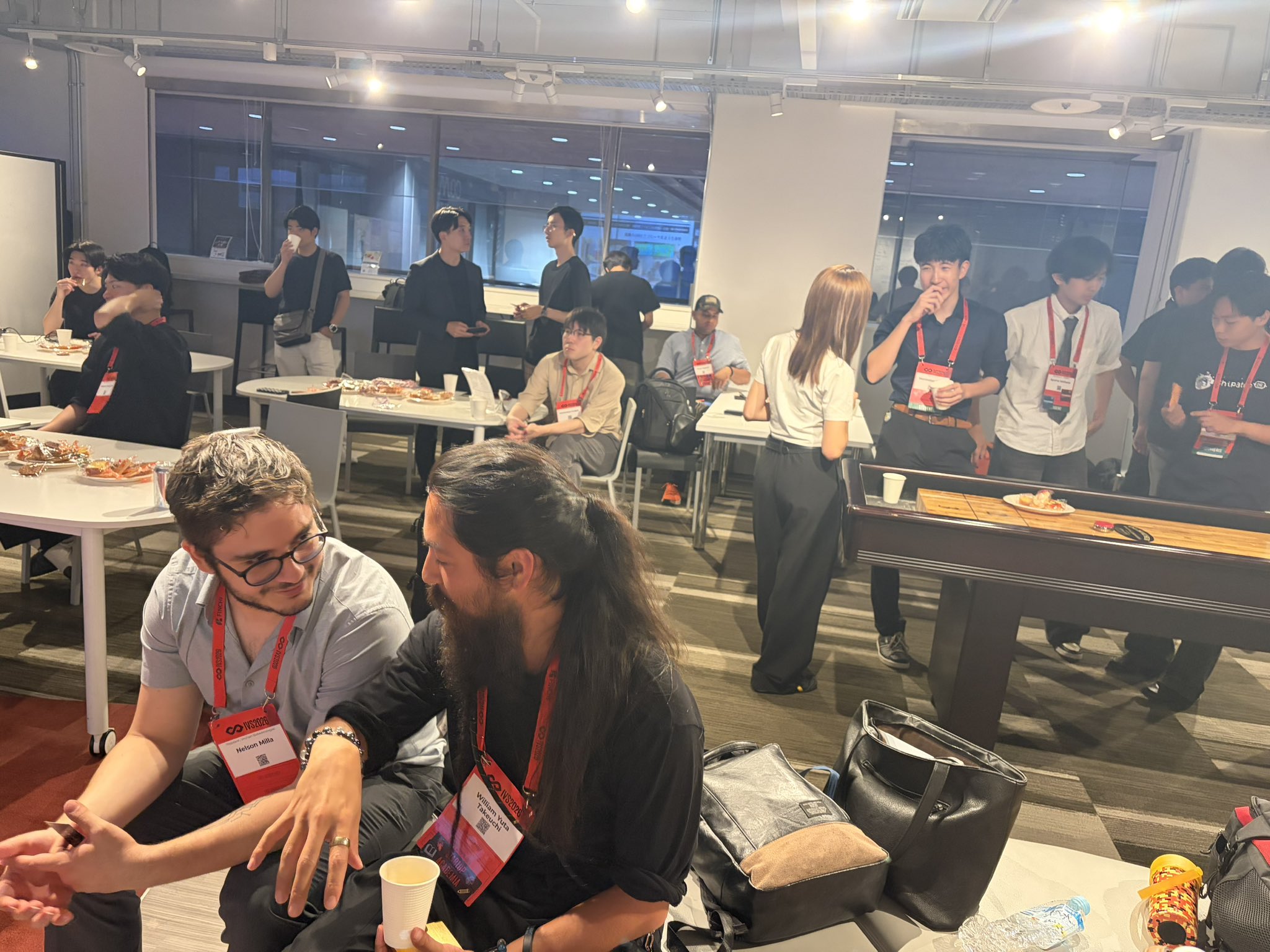 Event attendees networking at a Tokyo community meetup
